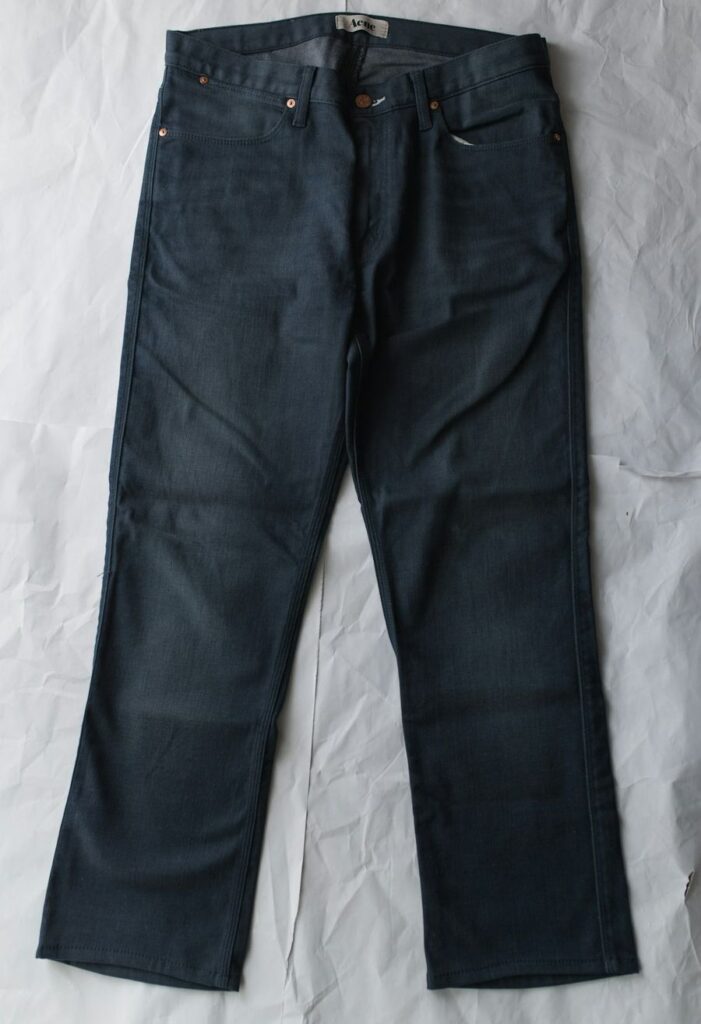 Jean bootcut taille haute Guess délavé clair – mode femme Boutique Platine Porrentruy